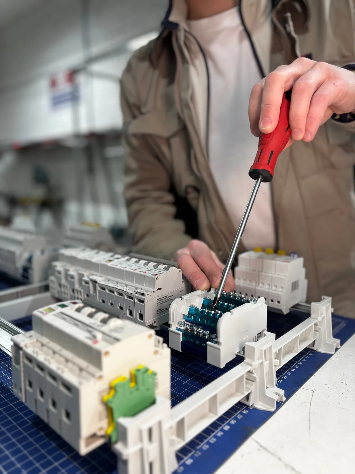 Breakers assembled on a DIN rail before installation, for licensed electrician in Windsor
