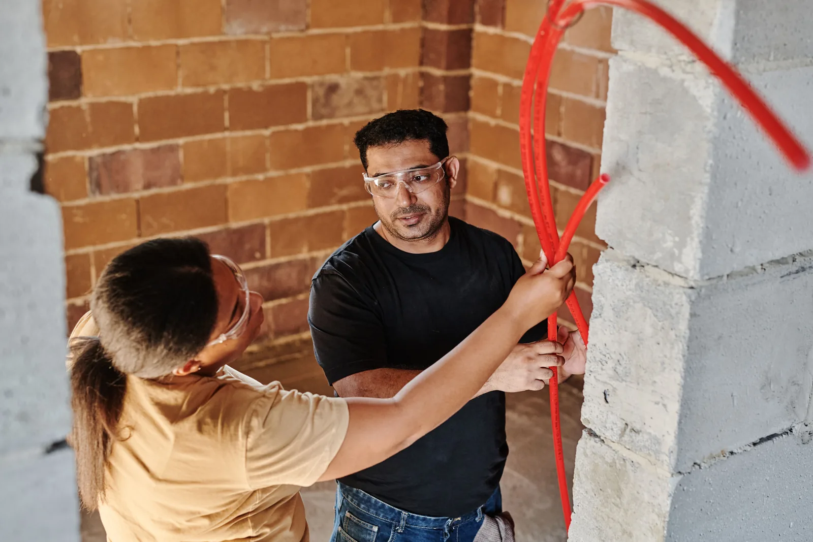 Running conduit across a block wall, for ev rebate in Windsor